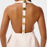 Yvonne Mini Dress with Halter Neck and Open Back with Floral Detail