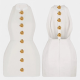 Yvonne Mini Dress with Halter Neck and Open Back with Floral Detail